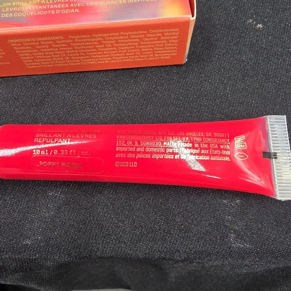 r.e.m. beauty Wicked For Good Poppy Punch Plumping Lip Gloss 8.33 oz NEW